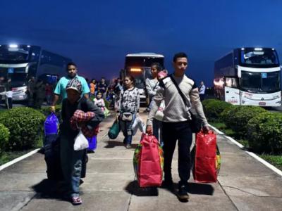 Venezuelan refugees arrive at Boa Vista airport in northern Brazil